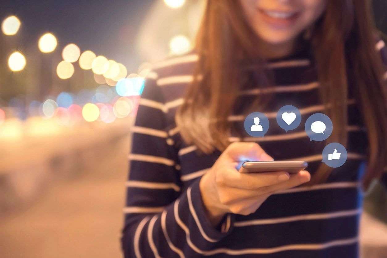 Woman using smartphone for social media